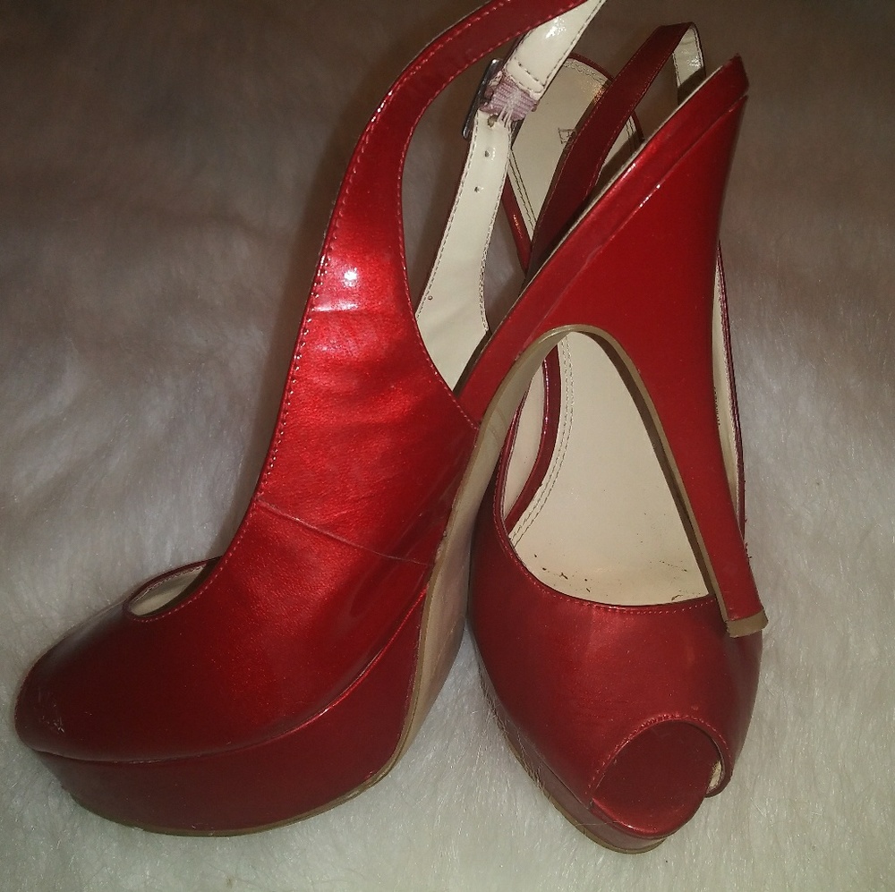 Enzo Angiolini red patent pumps